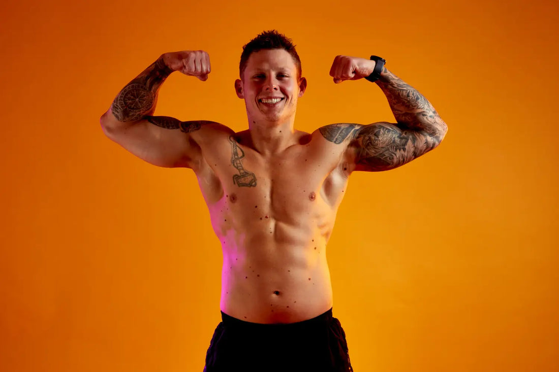 Muscular man flexing in gym mirrors for psychological boost and gym making progress