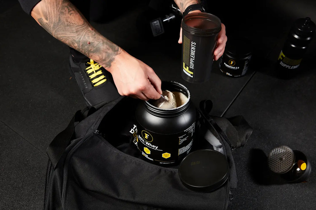 Black protein powder container with scoop for your fitness goals in Your Fitness journey