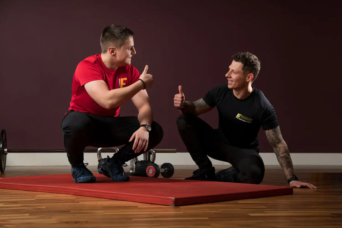 Two men giving thumbs up as a positive sign to beat winter blues or seasonal affective disorder