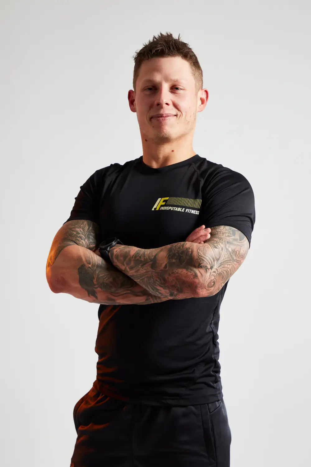 Man in fitness apparel demonstrating effective workout for weight loss