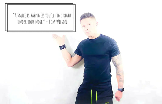 Man in athletic wear with motivational quote about ask for help at the gym