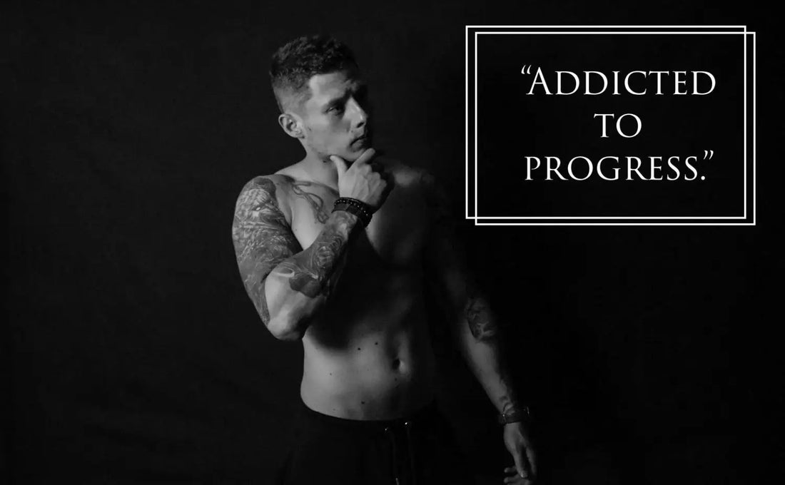 Tattooed man with motivational quote highlighting a personal trainer’s inspiration and the best fish oils